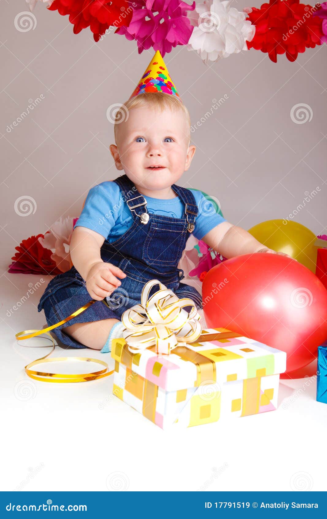 Cheerful Infant in a Party Hat Stock Image - Image of grey, looking ...