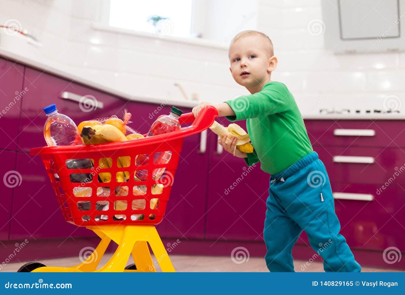 child's plastic shopping cart