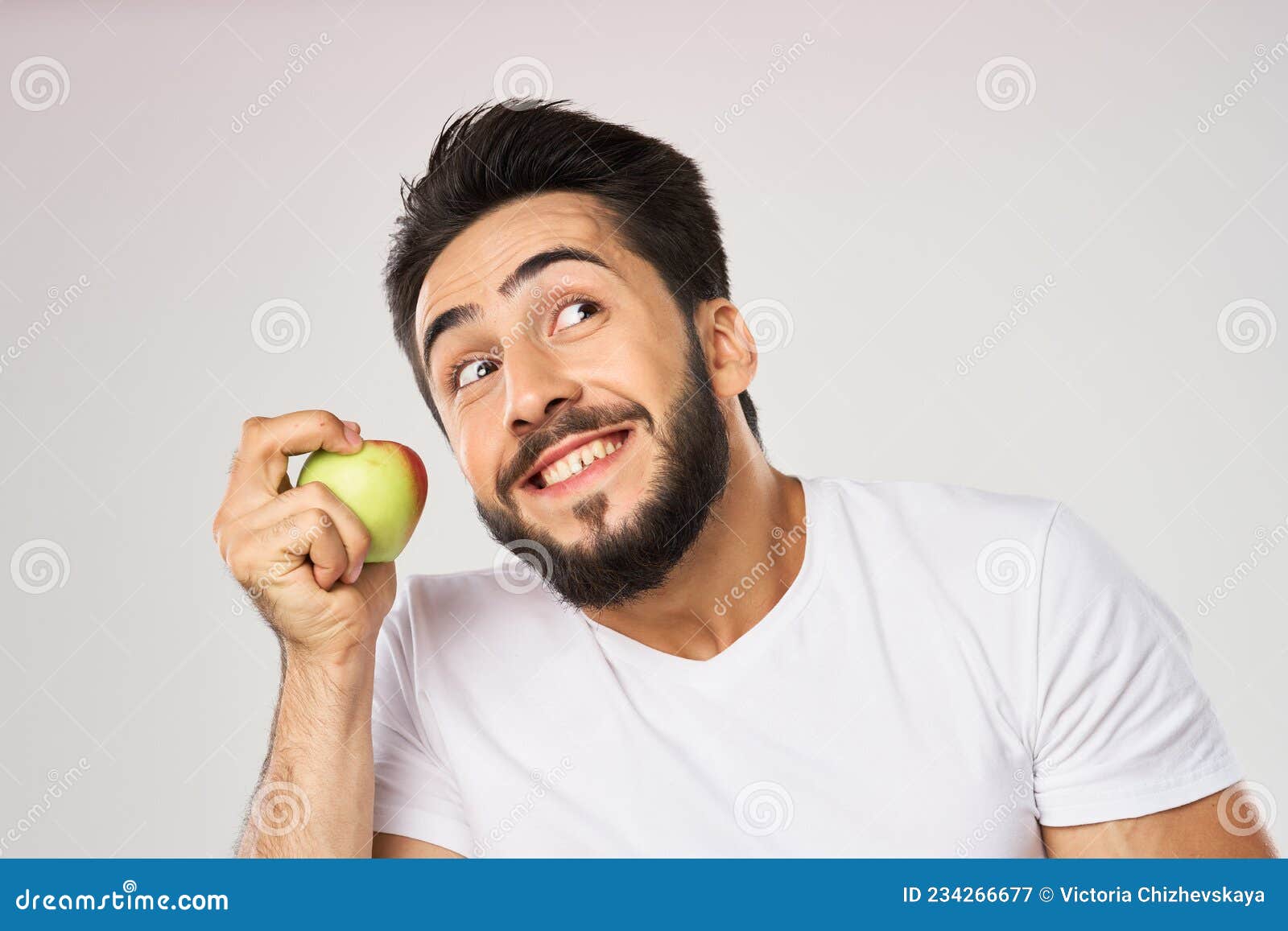 Cheerful Man with Apples in His Hands in a White T-shirt Fruits Stock ...