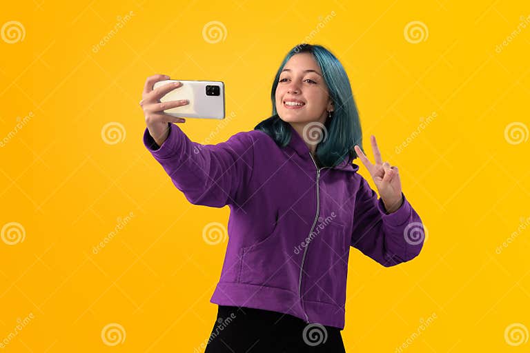 Selfie of a girl with bright blue hair - wide 3