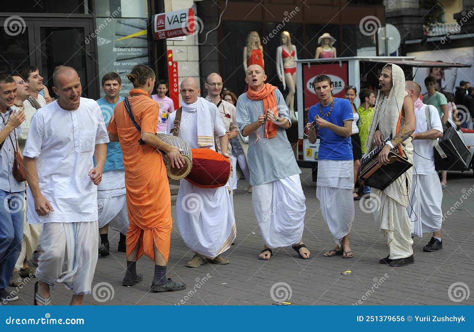 Cheerful People in Indian Clothes, Hare Krishna Believers, Dancing