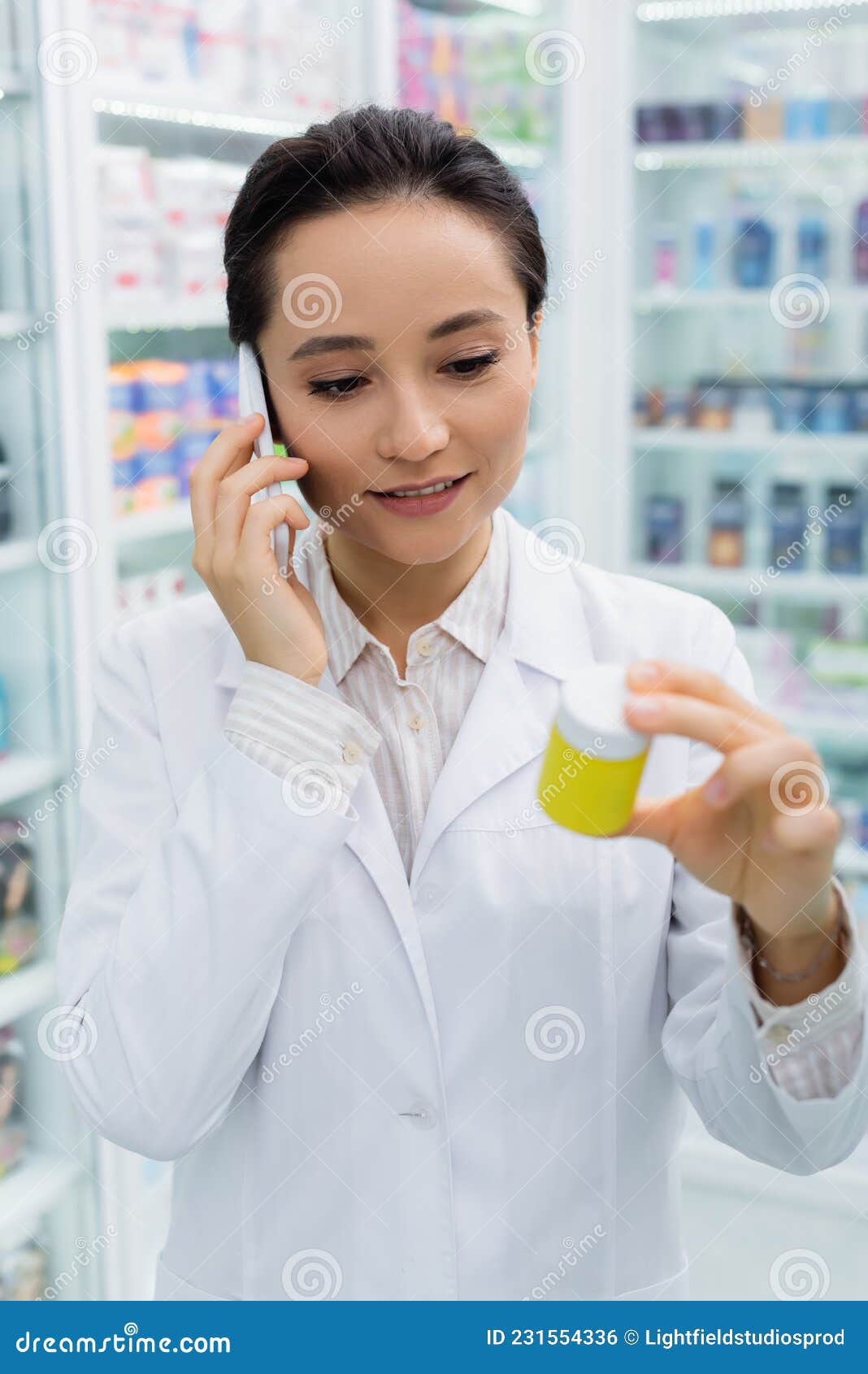 Cheerful Pharmacist in White Coat Talking Stock Photo - Image of retail ...