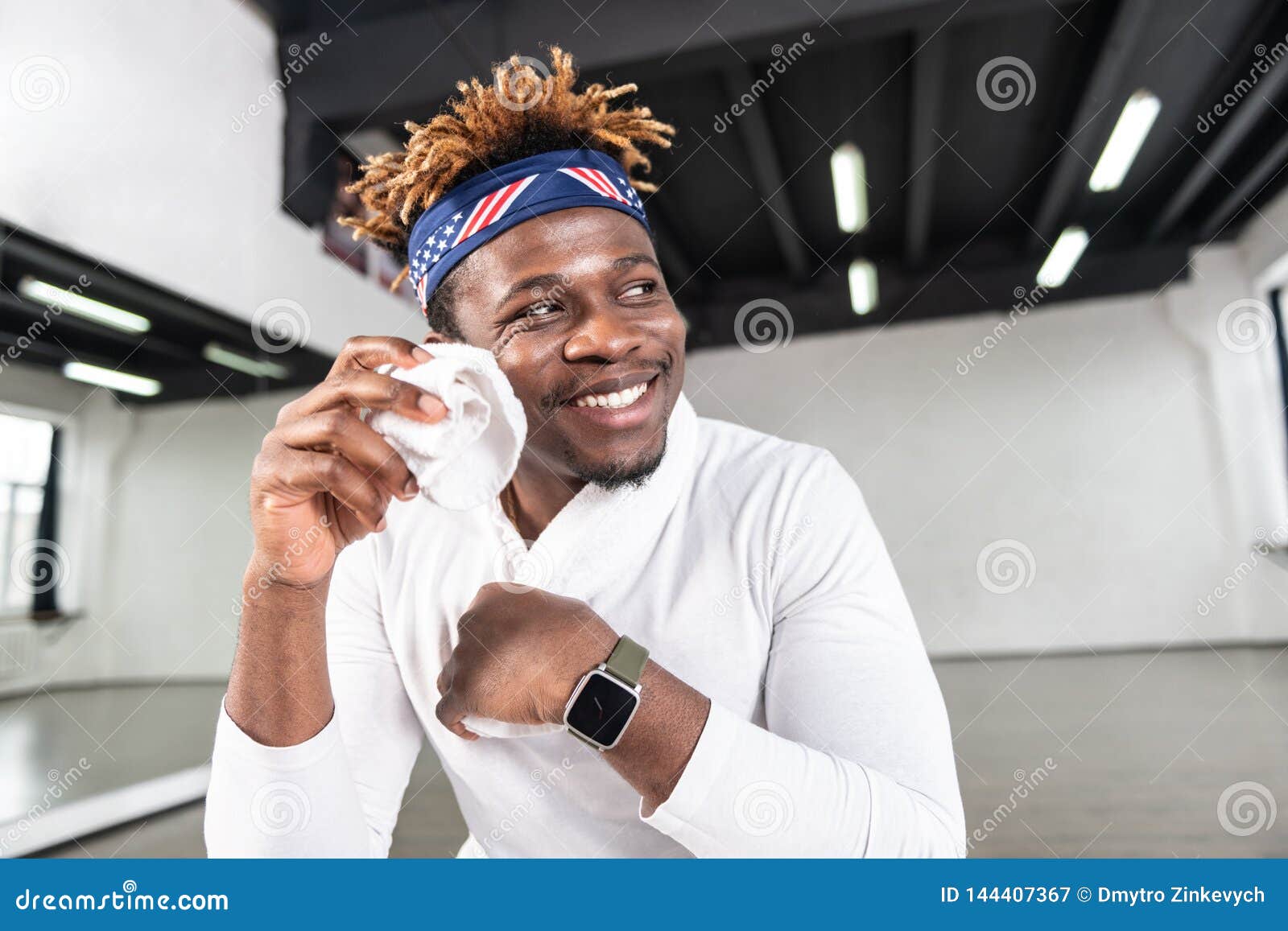 Cheerful Positive Young Guy With Short Dreadlocks Carrying