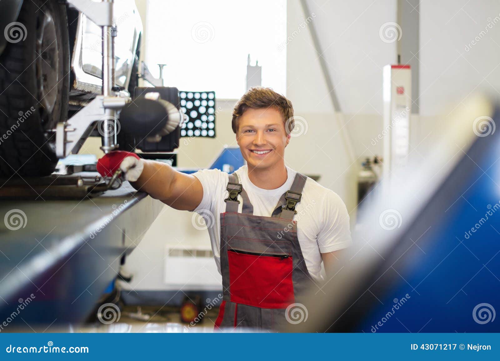 Cheerful Serviceman in a Car Body Stock Image Image of