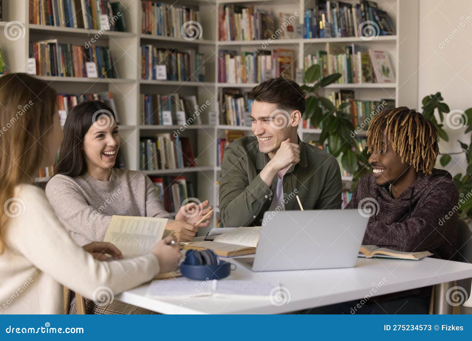 Cheerful Students Sit Library Discuss Teamwork Task, Smile, Laugh Stock Image Image of group