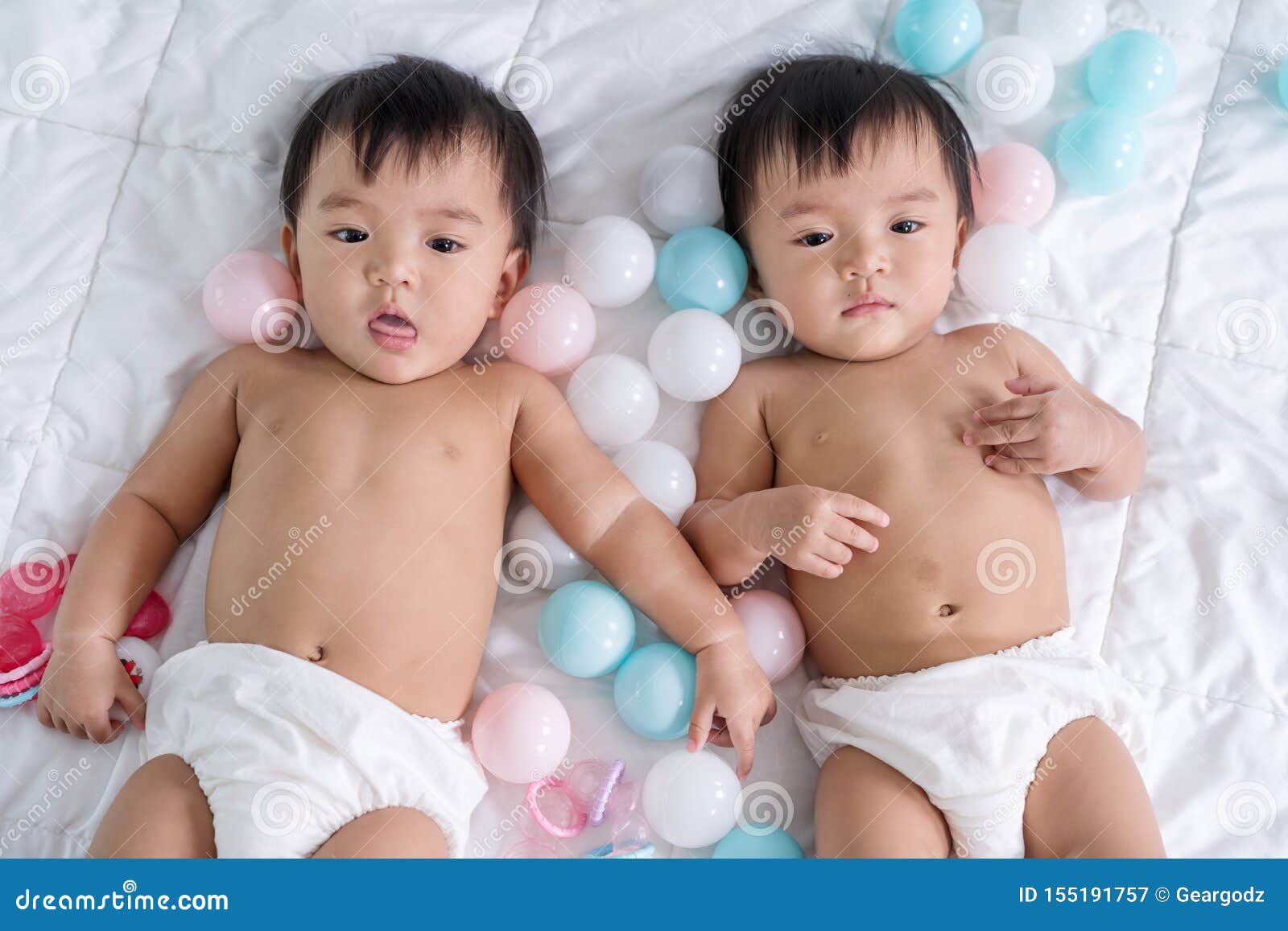 Cheerful Twin Babies on Bed Stock Image Image of lying, happiness
