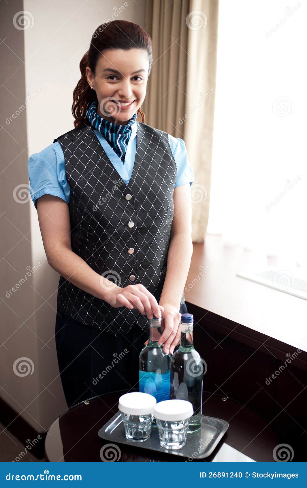 Cheerful Waitress Opening Bottle of Beverage Stock Photo Image of