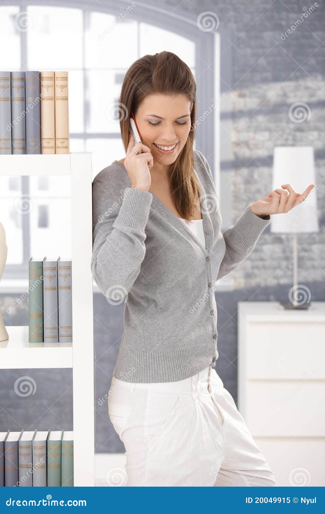 Cheerful Woman on Phone Call at Home Stock Image - Image of brunette