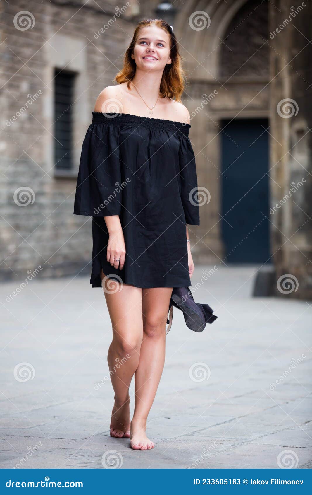 https://thumbs.dreamstime.com/z/cheerful-young-girl-walking-barefoot-cheerful-young-girl-walking-barefoot-architecture-summer-233605183.jpg?ct=jpeg
