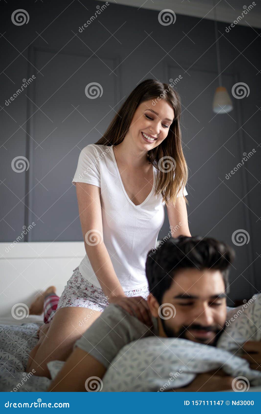 Cheerful Young Couple Making Massage at Home Stock Image - Image of girl,  girlfriend: 157111147