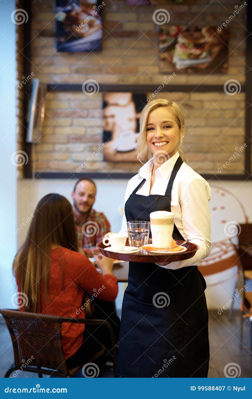 young waitress smiling happy