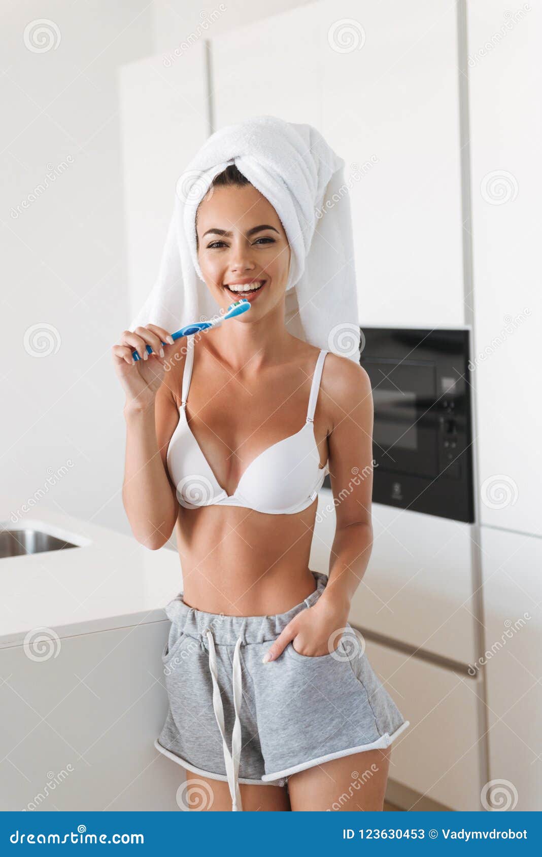 Cheerful Young Woman in Bra and Towel Stock Image - Image of cosmetic,  oral: 123630453