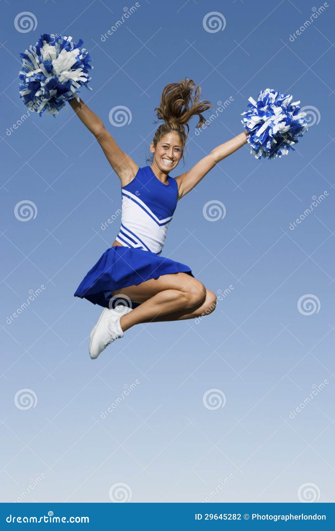 Cheerleader Jumping with Pom-Poms Stock Photo - Image of energy, cheerful:  29645282