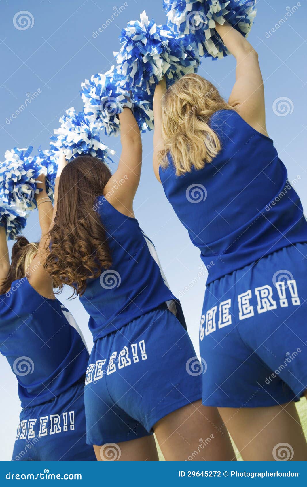 Cheerleaders in Blue Costume Cheering Stock Photo Image of