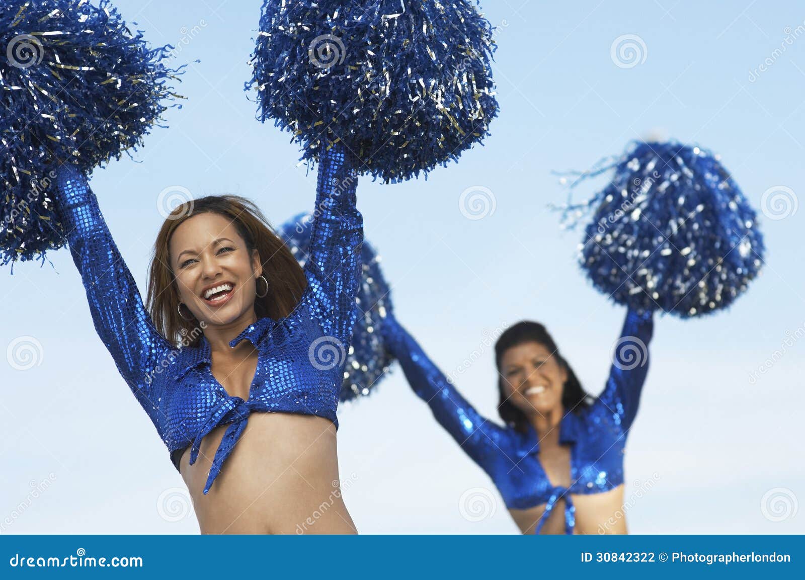 Cheerleaders With Pom Poms Raised Stock Photo Image Of Confidence Beautiful