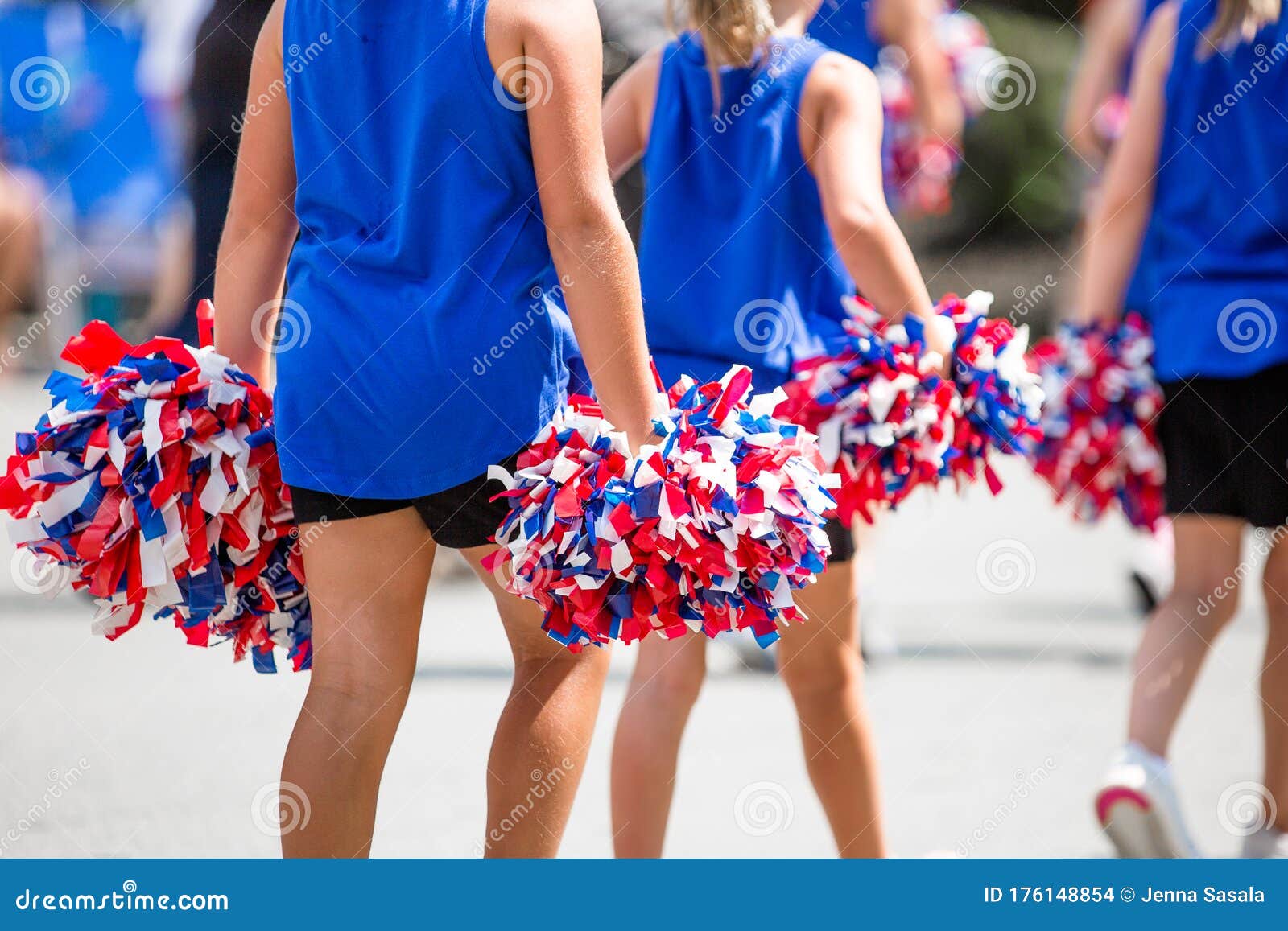 Red White And Blue Pom Poms On White Background Stock Photo