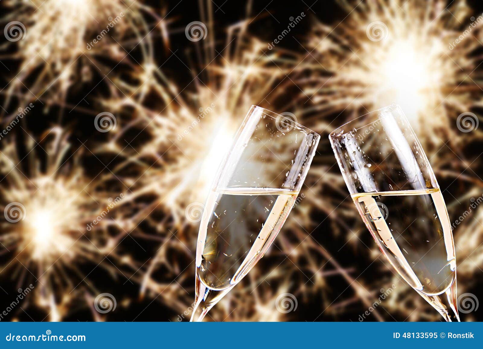 Cheers. Champagne Glasses with Fireworks in Background Stock Image
