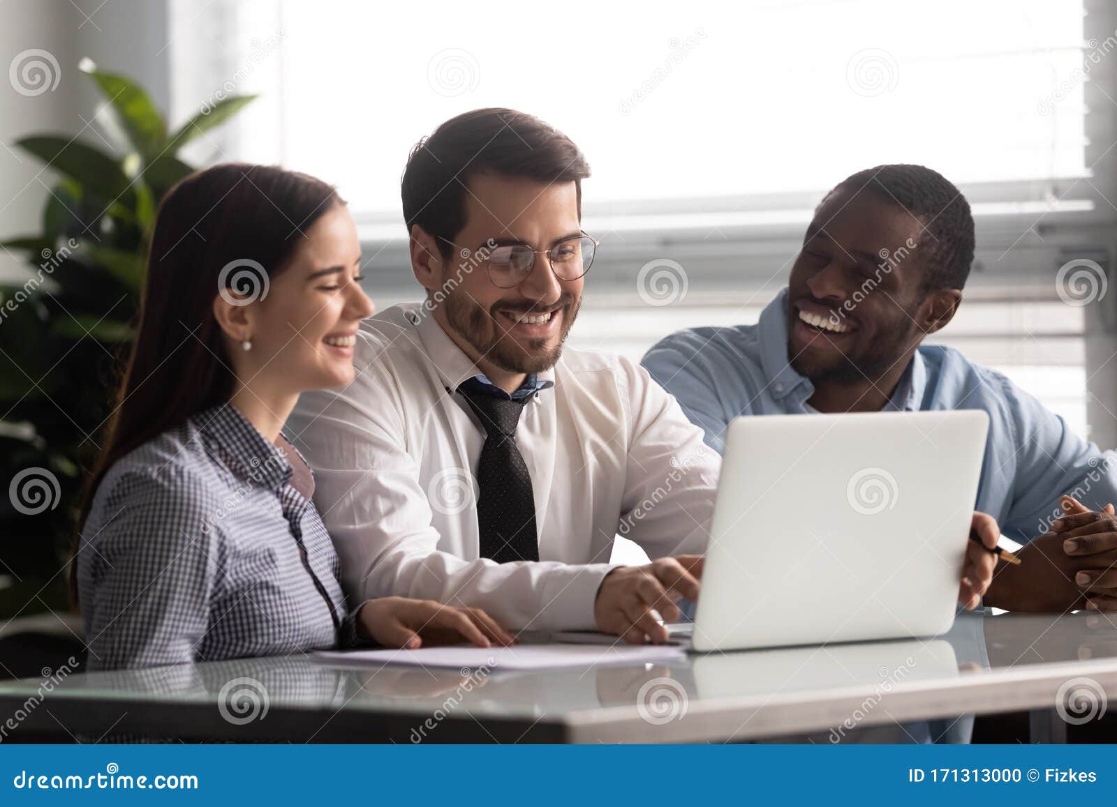 Cheery Workers Sitting at Desk Watching Funny Videos on Laptop Stock Photo - Image of help, desk: 171313000 Cheery Workers Sitting at Desk Watching Funny Videos on Laptop Stock Photo - Image of help, desk: 171313000