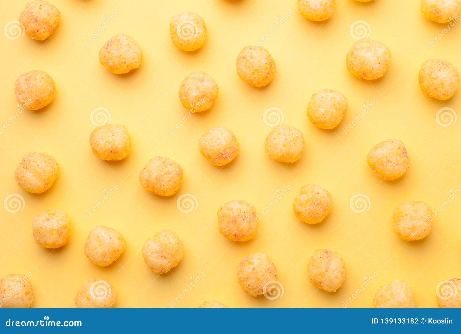 Cheese Balls on Yellow Background Stock Photo - Image of closeup, group:  139133182