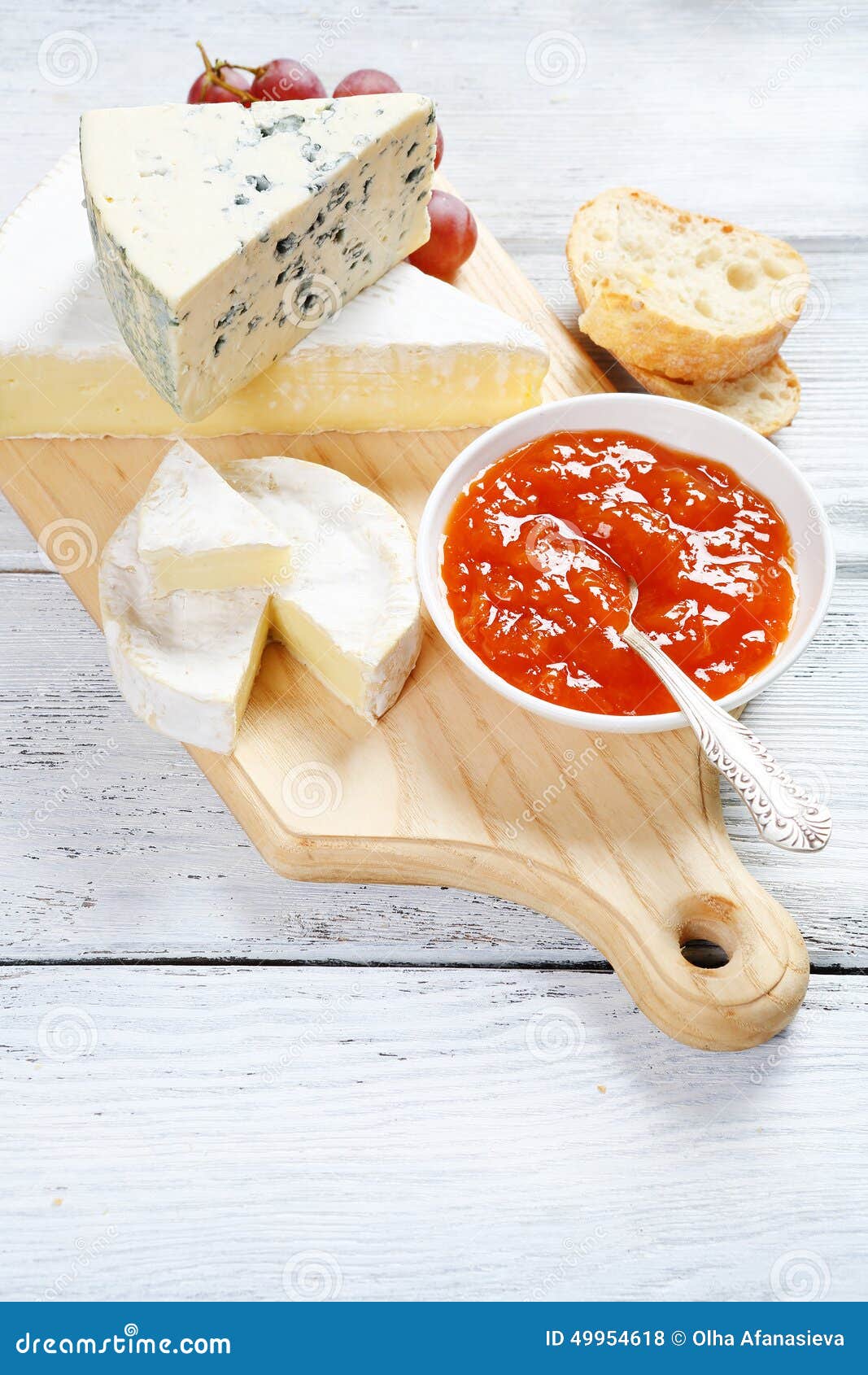 Cheese on a board with jam stock photo. Image of boards 49954618