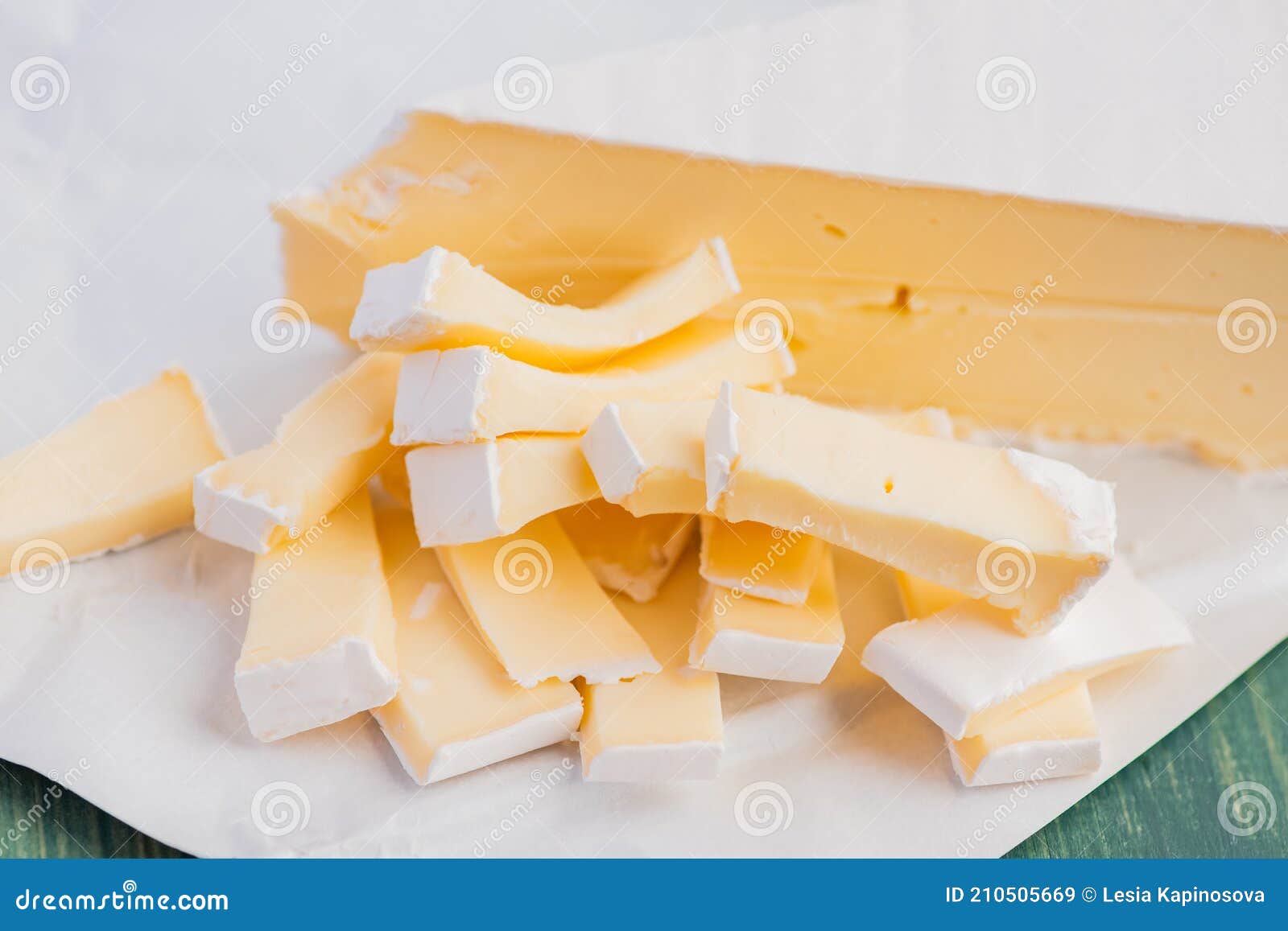 Cheese Camembert. Delicious Pieces of White Mold Cheeses with Soft