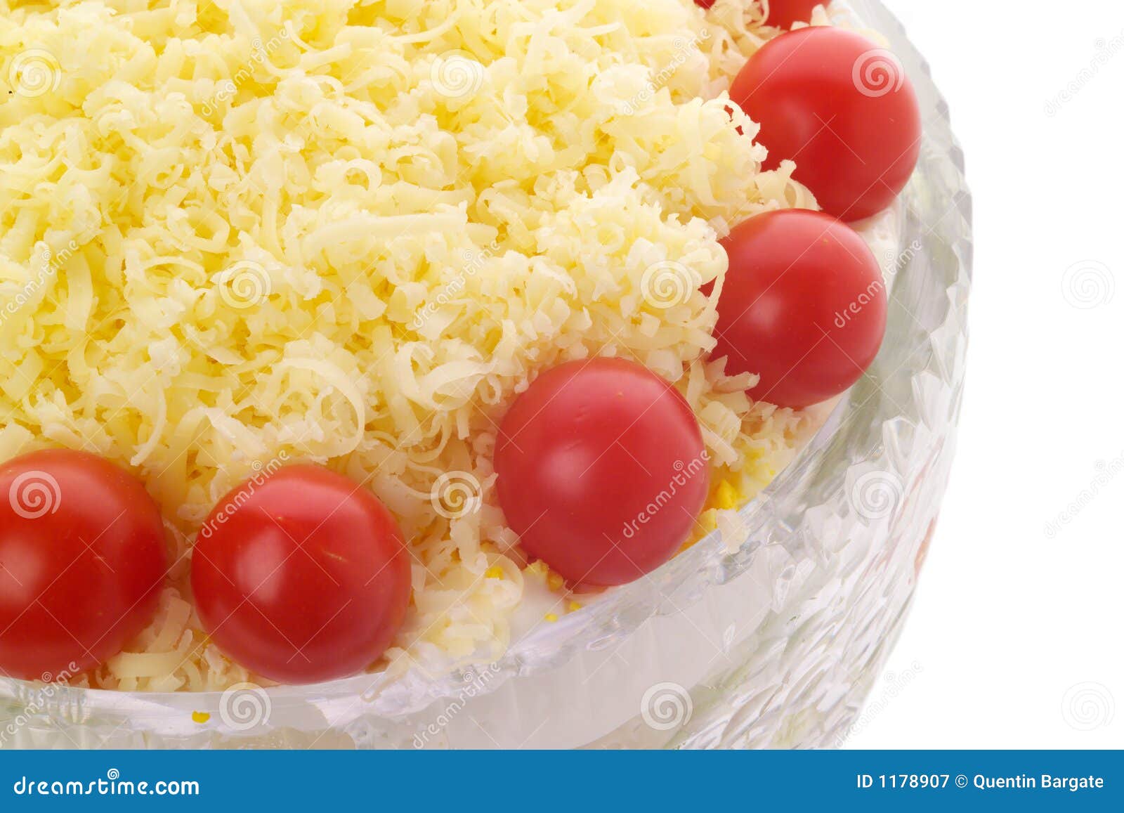 Cheese and Cherry Tomato Topped Salad in Crystal Bowl Stock Image