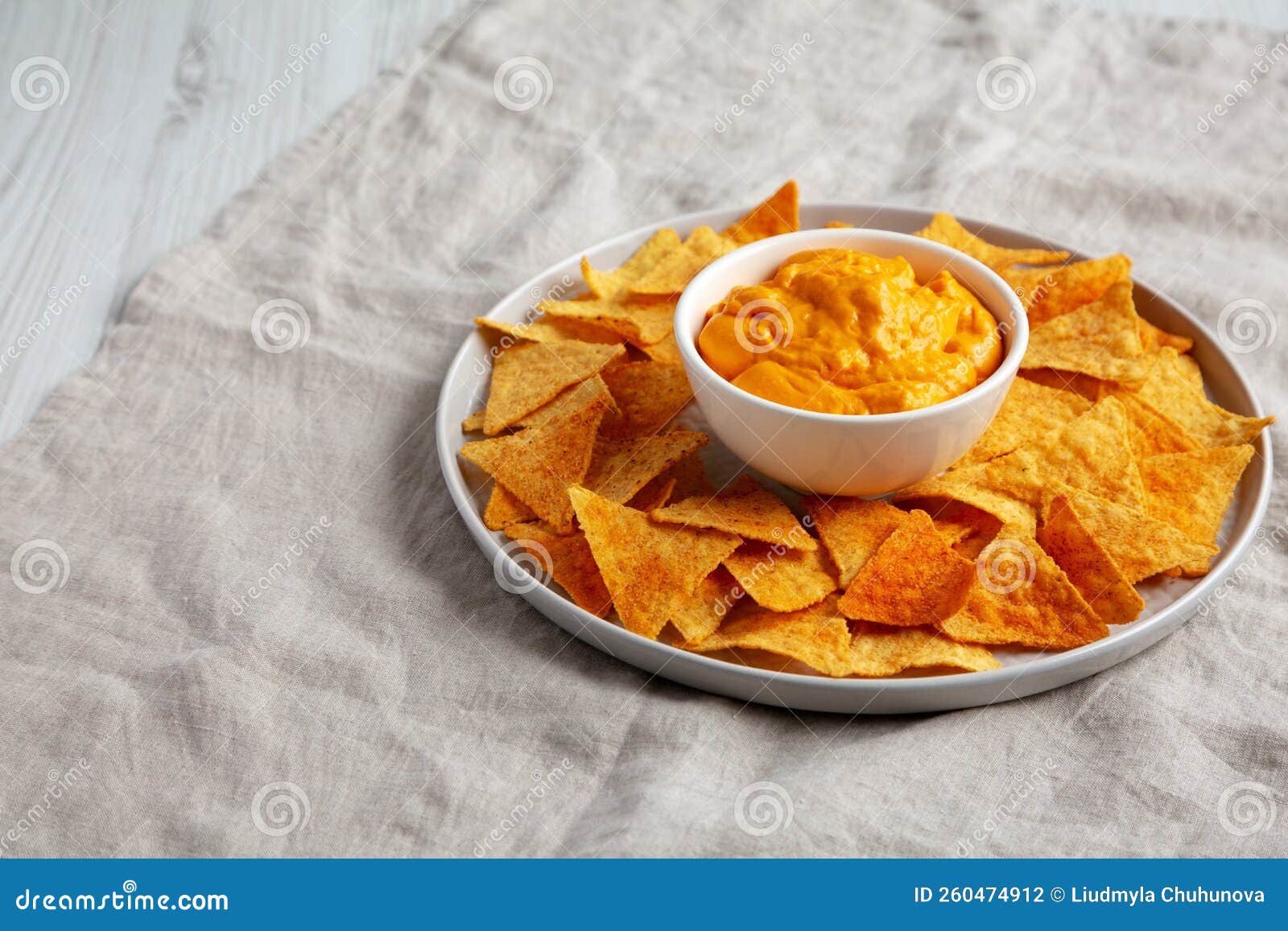 Cheese Dip with Tortilla Chips, Side View. Space for Text Stock Photo