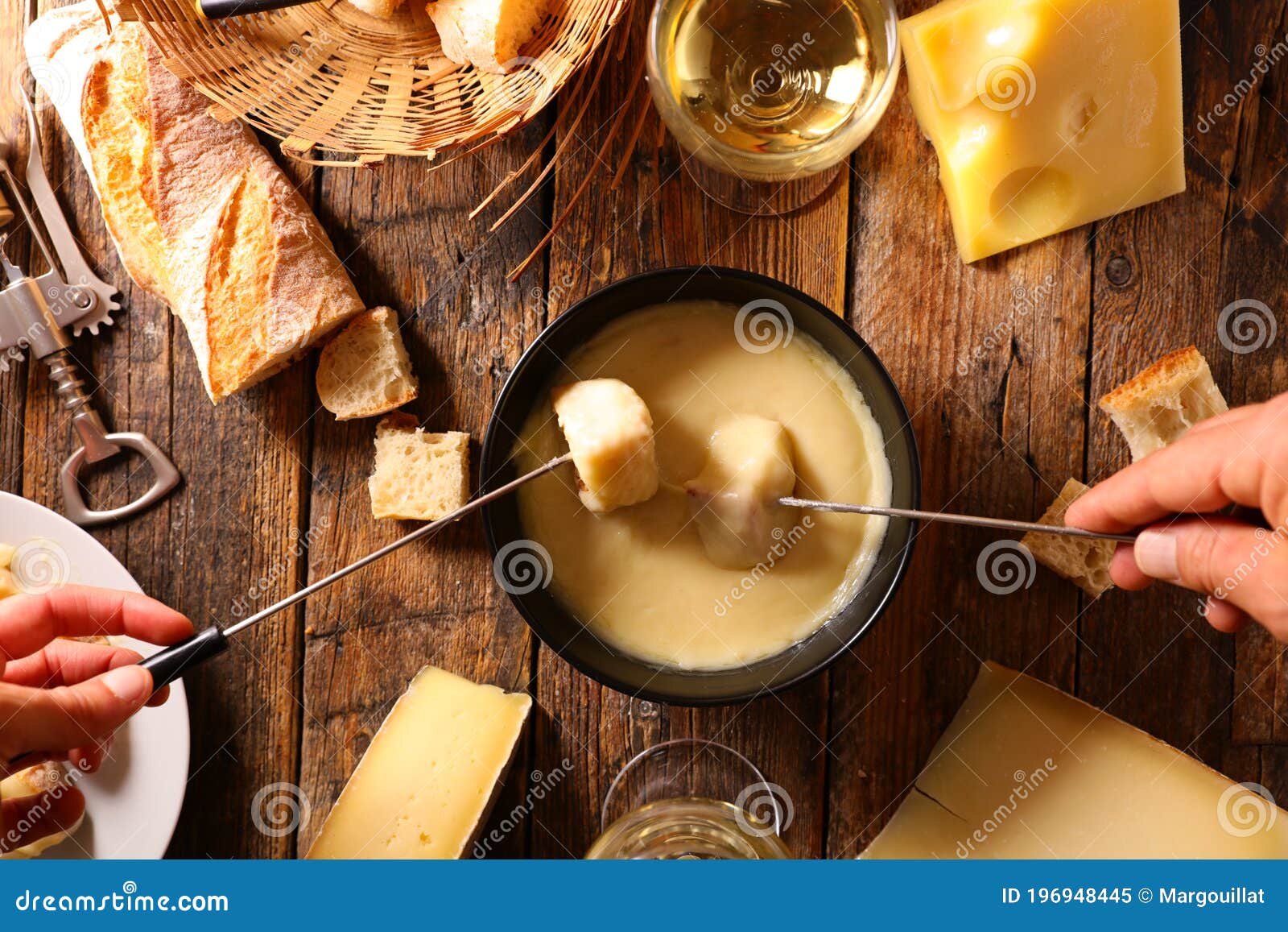Cheese fondue with wine stock image. Image of food, bread 196948445