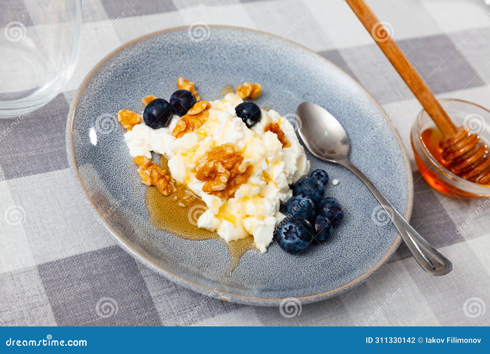 cheese and honey dessert with honey, walnuts and blueberries - mato con miel - catalan cuisine