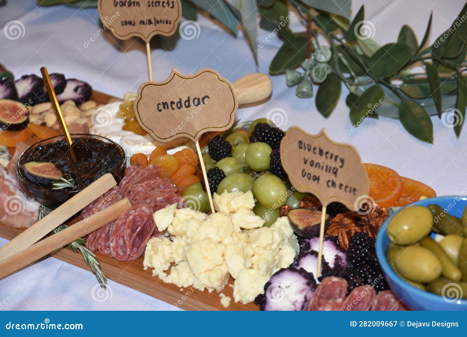 Cheese Meats and Olives on a Charcuterie Board Stock Image Image of