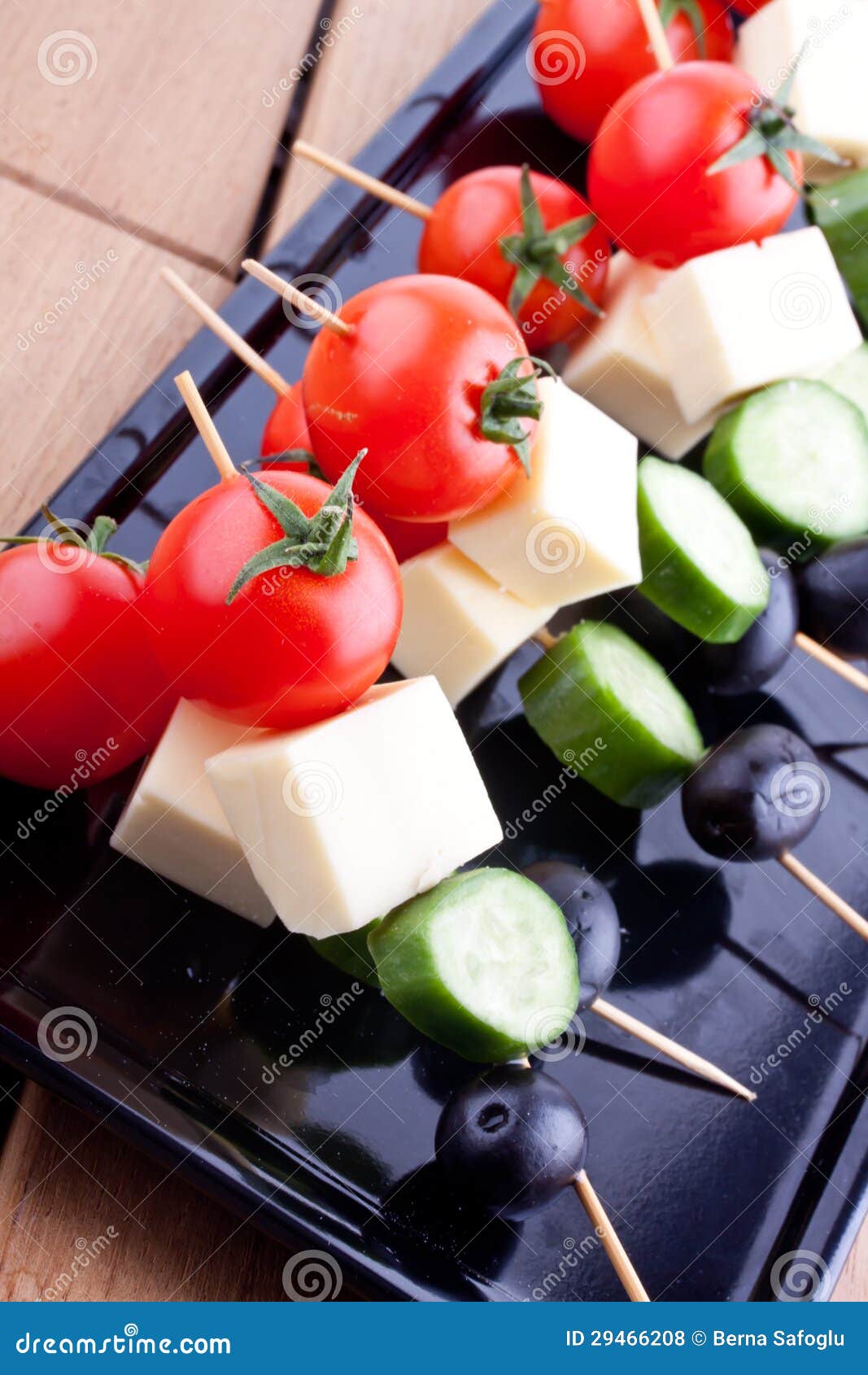 Cheese and Olive Canapes with Tomato and Cucumber Stock Photo Image