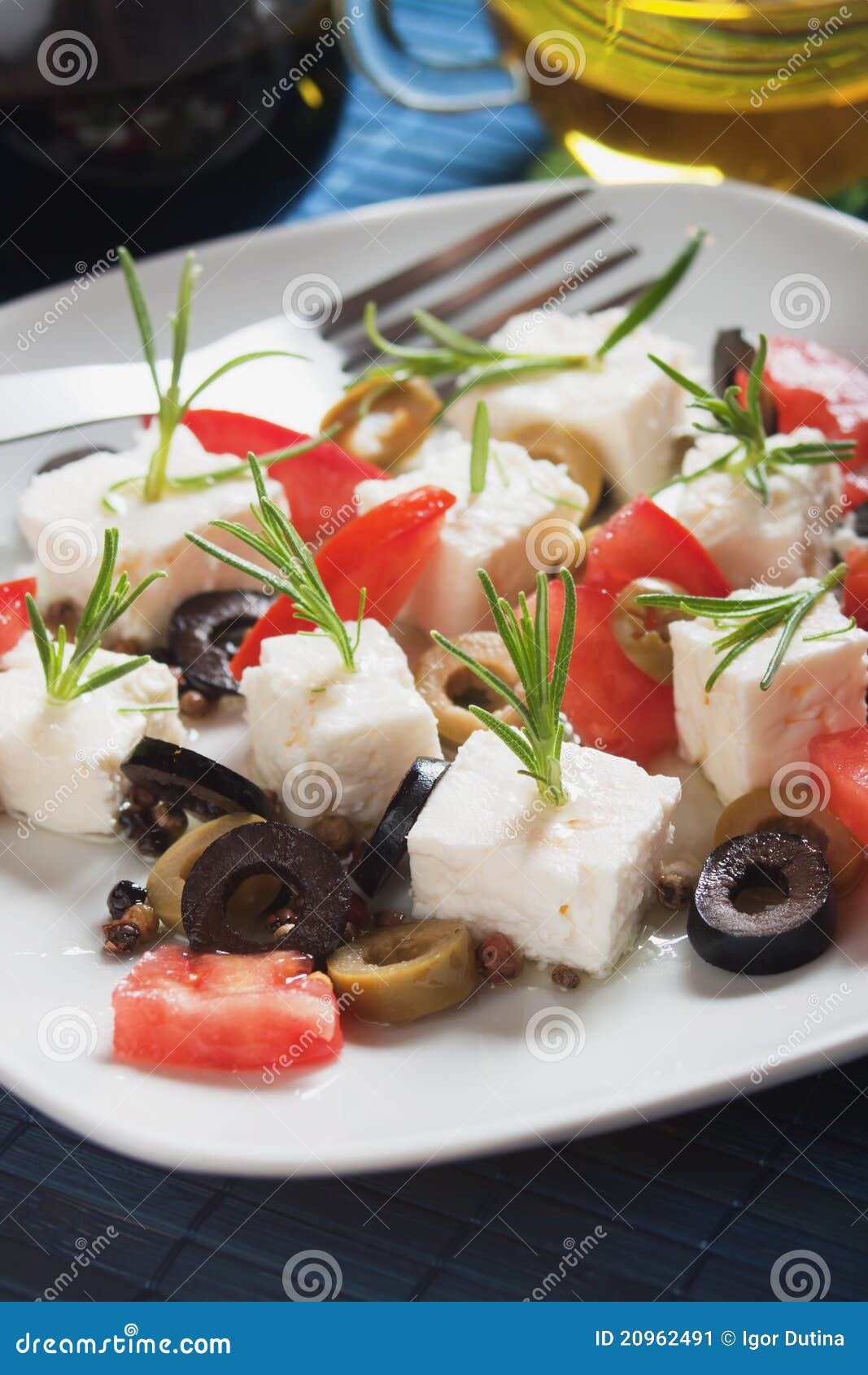 Cheese and olive salad stock image. Image of plate, black 20962491
