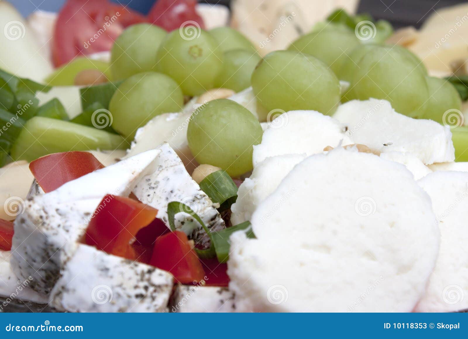 Cheese plate and grapes stock image. Image of mozzarella 10118353