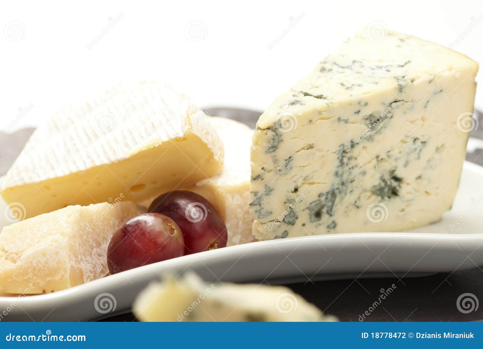 Cheese plate with grapes stock photo. Image of blue, grape 18778472