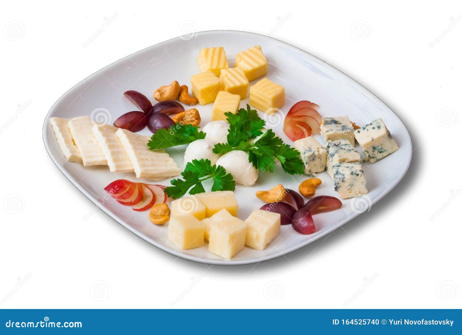 Cheese Plate Served with Grapes, Crackers and Nuts Stock Photo Image