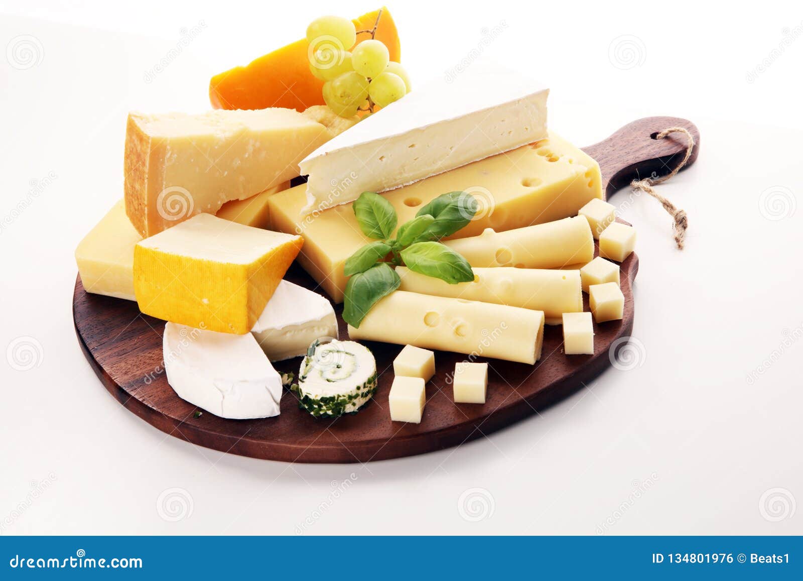 Cheese Plate Served with Grapes, Various Cheese on a Platter Stock