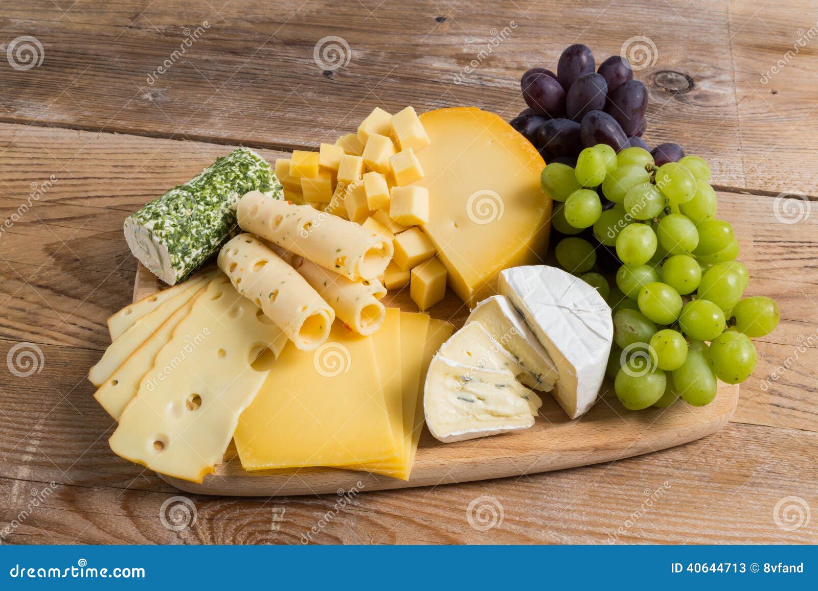 Cheese Plate Variation on a Wooden Table Stock Image Image of