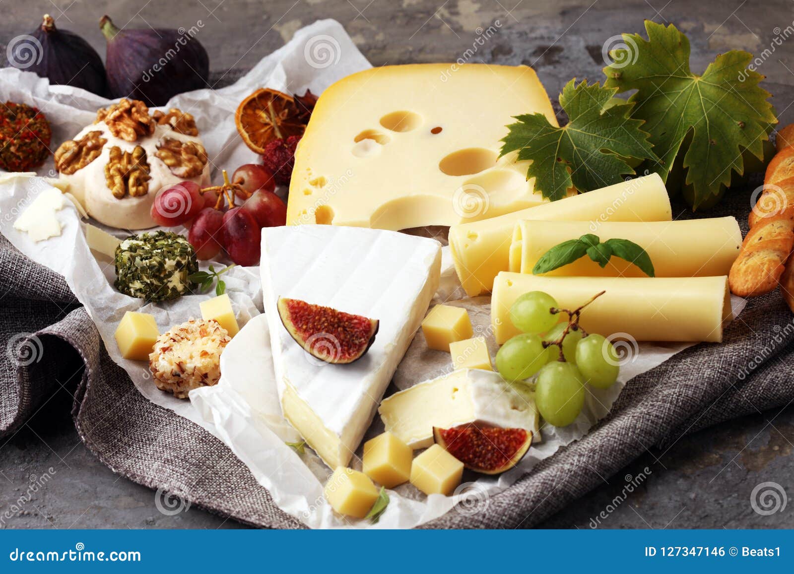 Cheese Platter with Different Cheese and Grapes. Stock Photo Image of