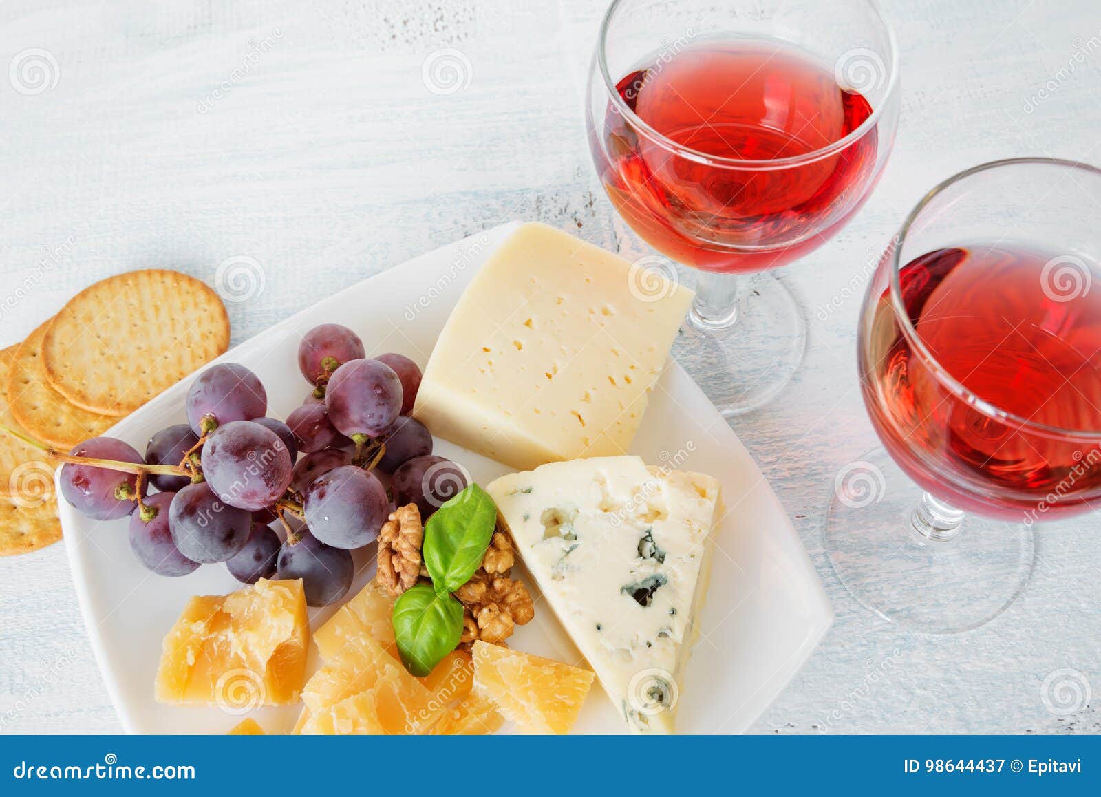 Cheese Platter and Two Glasses of Red Wine Stock Image Image of basil