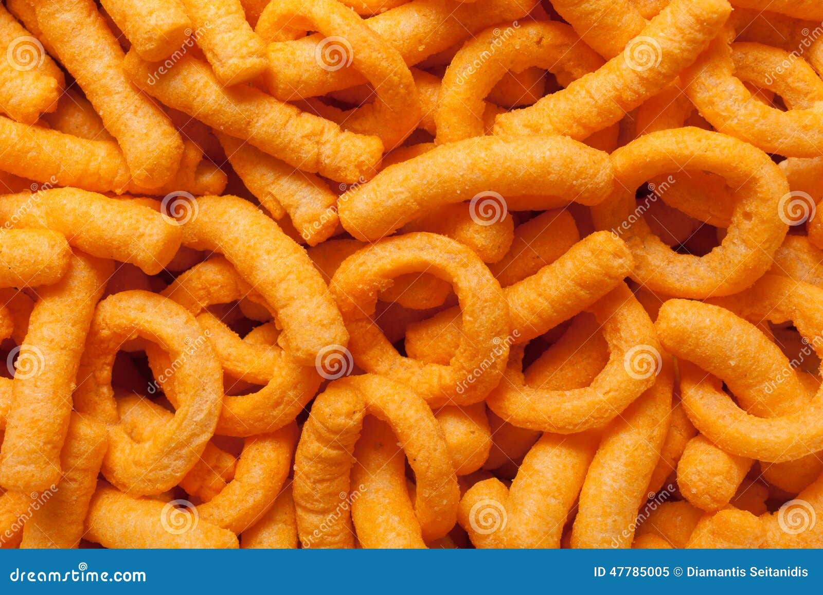 Cheese puffs stock image. Image of cheddar, orange, fattening 47785005