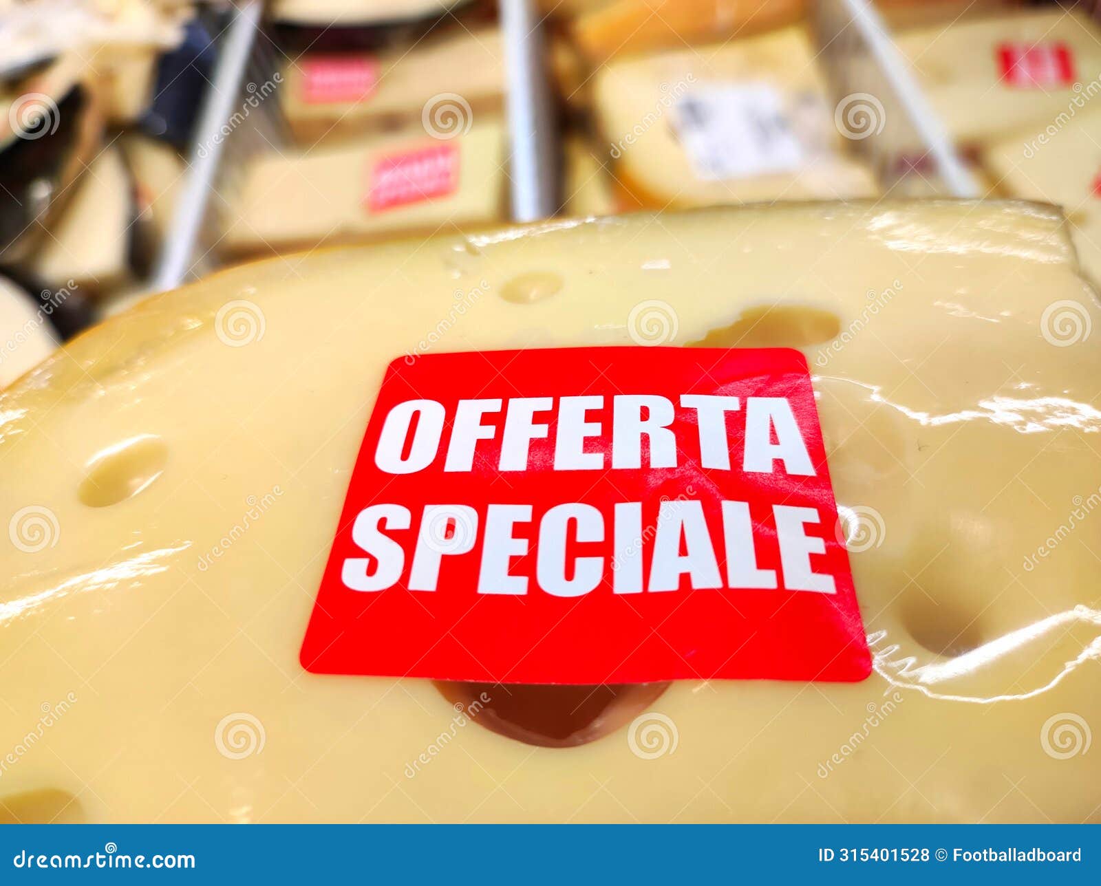 a piece of cheese with holes, being sold at a discount, with the words special offer in italian