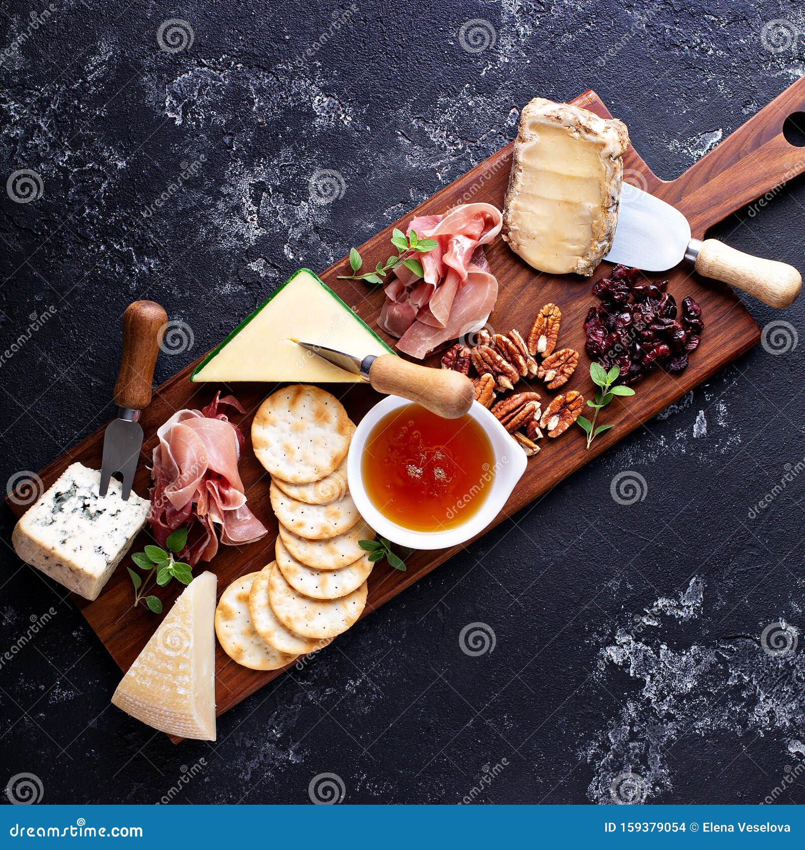 Cheese and snack board stock photo. Image of plank, delicatessen