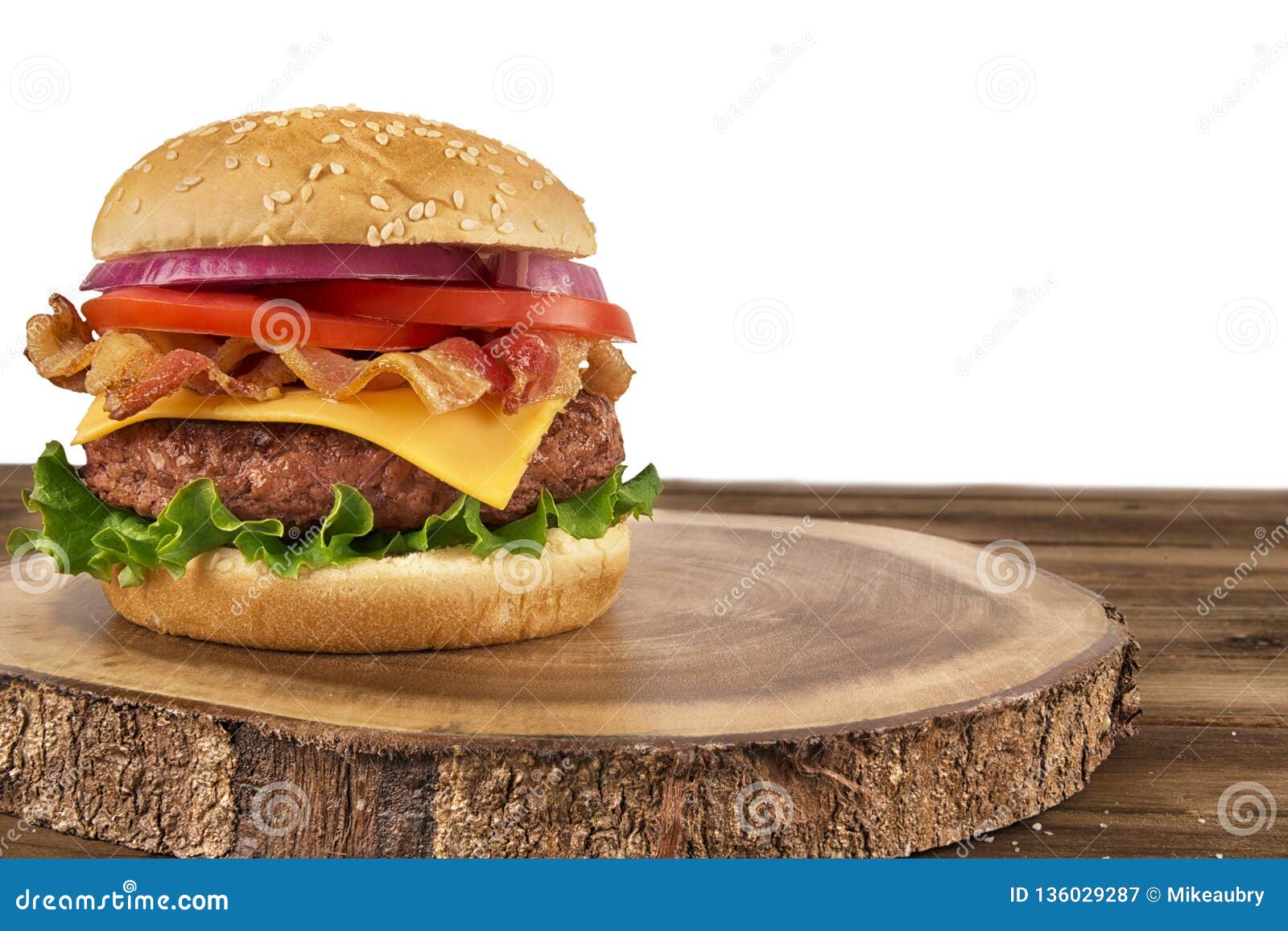 Cheeseburger With Beef Patty And Bacon Isolated On White Background