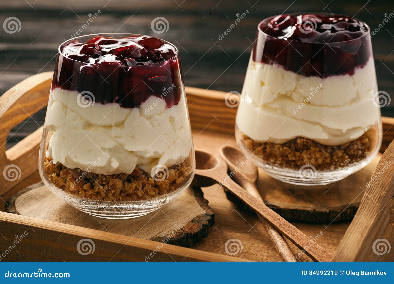 Cheesecake with Cherry Jelly in Glass Jars. Stock Image Image of