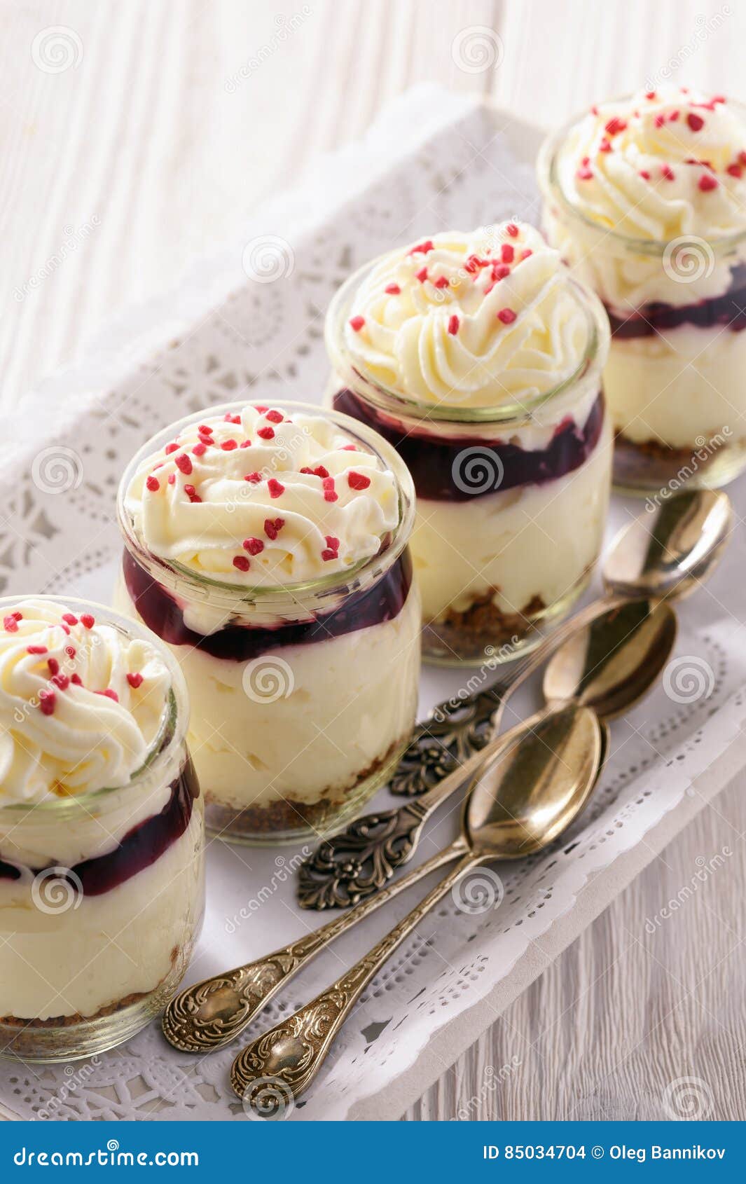 Cheesecake with Cherry Jelly in Glass Jars. Stock Photo Image of