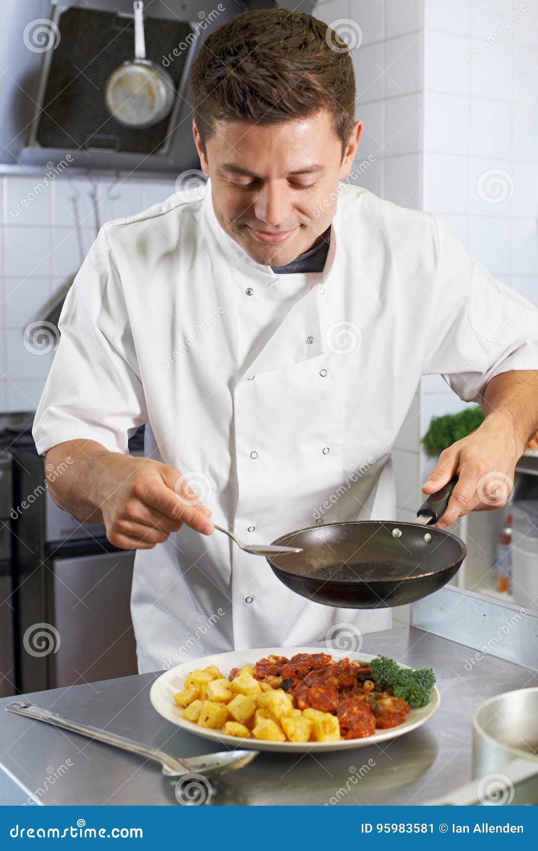 Chef Adding Sauce To Dish in Restaurant Kitchen Stock Image Image of sauce, food 95983581
