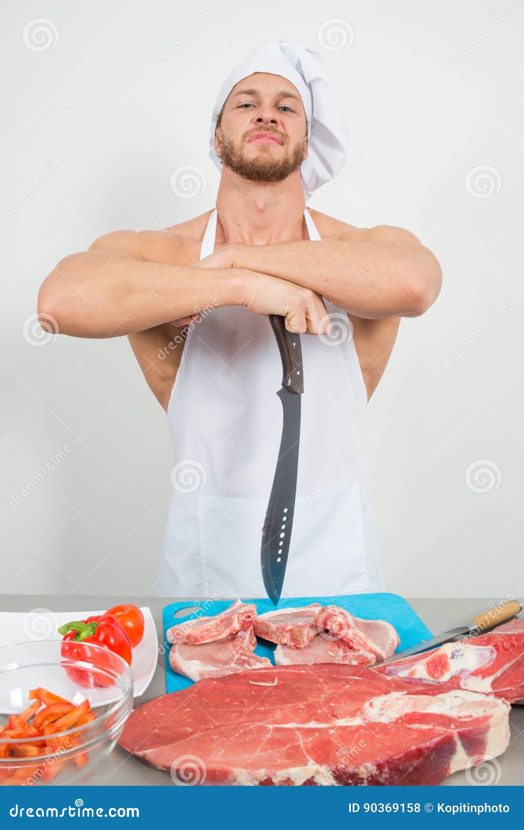 Chef Bodybuilder Preparing Large Chunks of Raw Meat. Natural Proteins