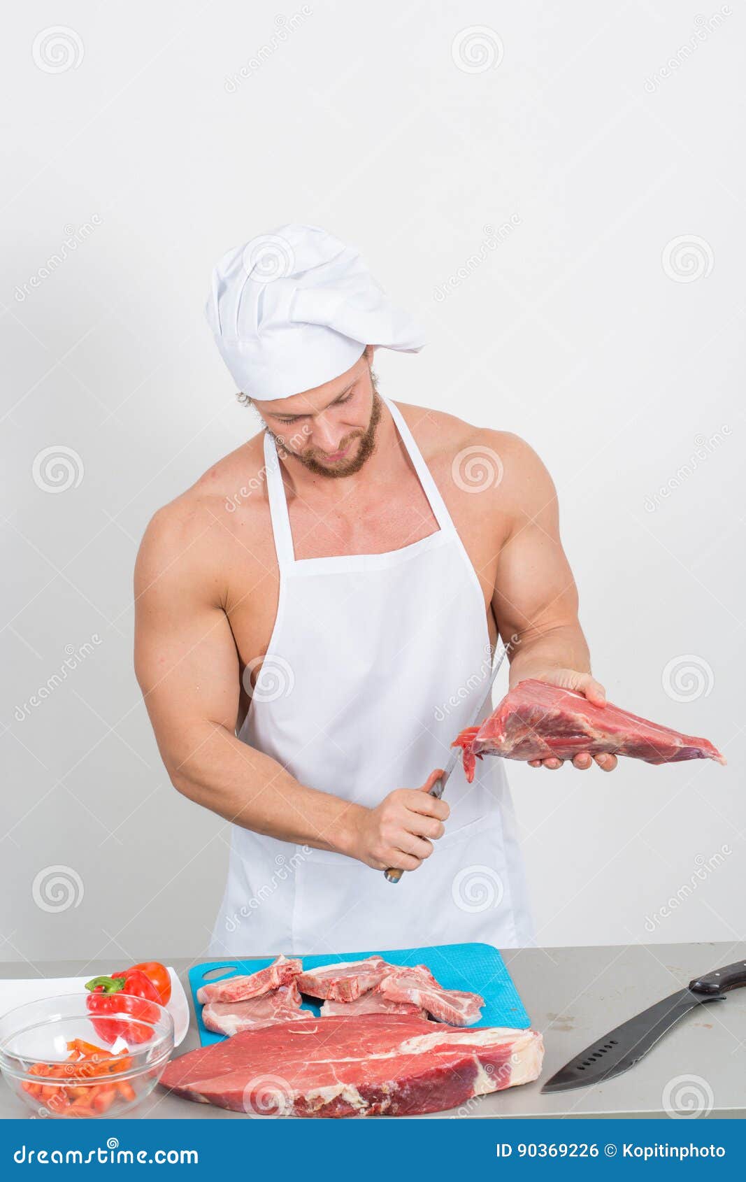 Chef Bodybuilder Preparing Large Chunks of Raw Meat. Natural Proteins