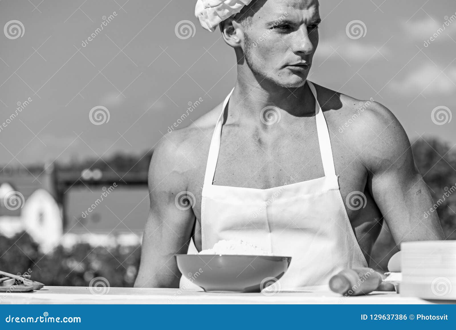 Chef Cook With Nude Muscular Torso Man On Confident Face Wears Cooking Hat And Apron Skyline 