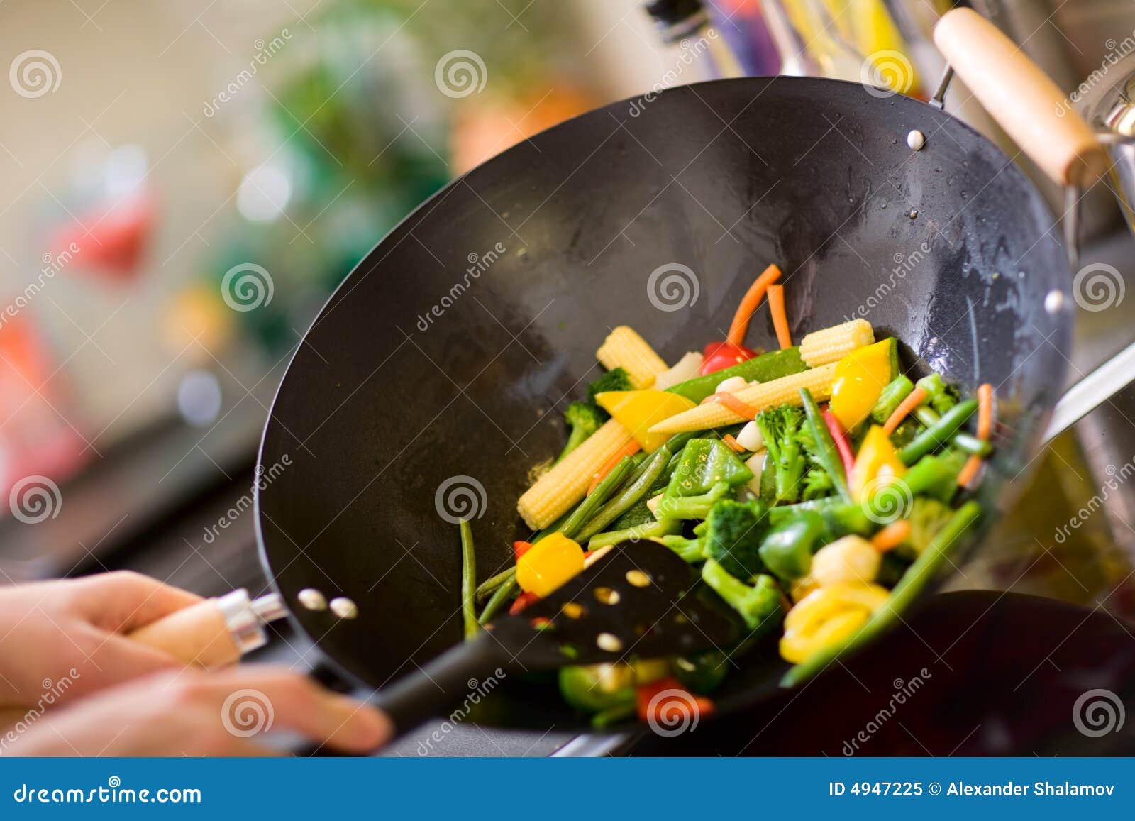 chef cooking wok